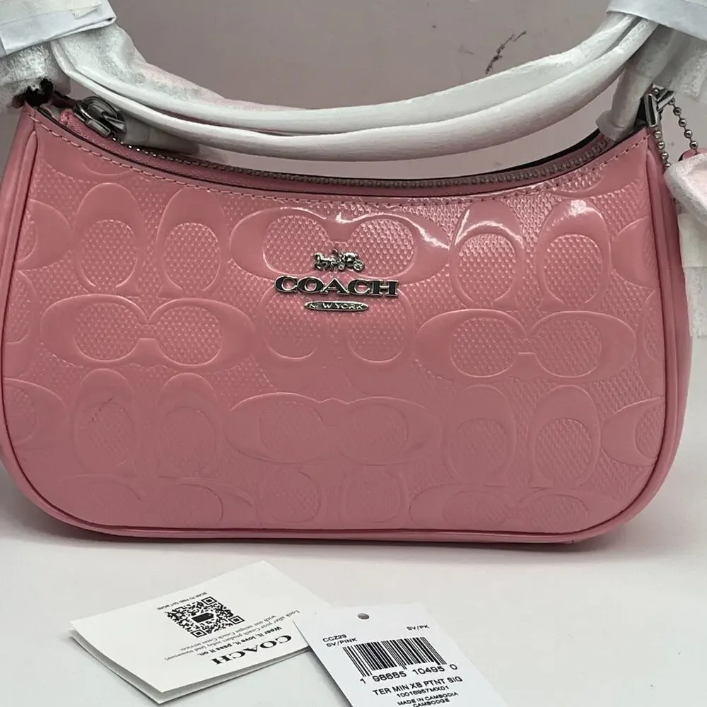 Coach Teri Mini Crossbody Bag Signature Patent Leather Heart Charm CCZ29 pink